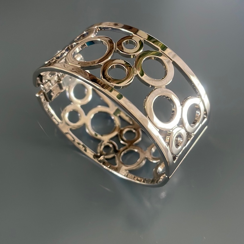Stainless steel, wide, hinged, bangle bracelet 7 1/2 inch